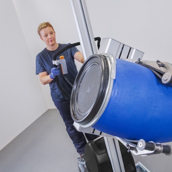 Lifting and emptying drums — photograph 2