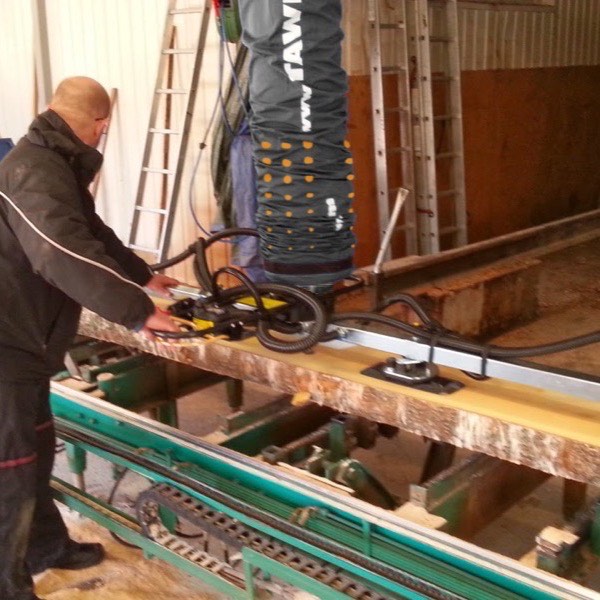 Lifting and stacking boards — photograph 2